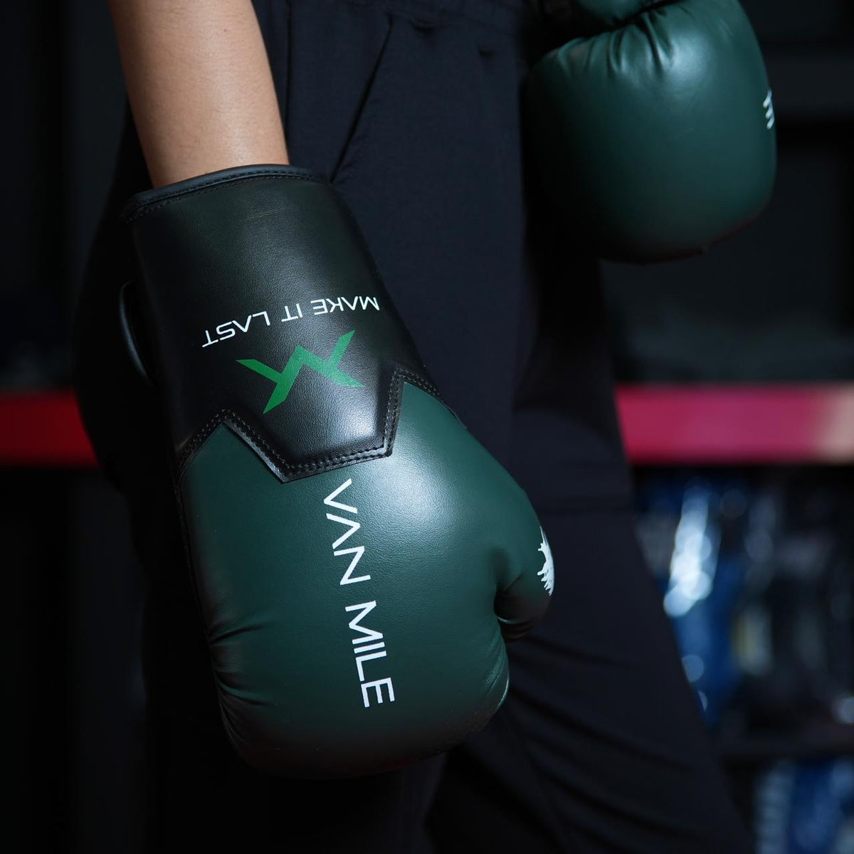 VAN MILE PU 3.0 Boxing Gloves in Black & Green – worn on model, side