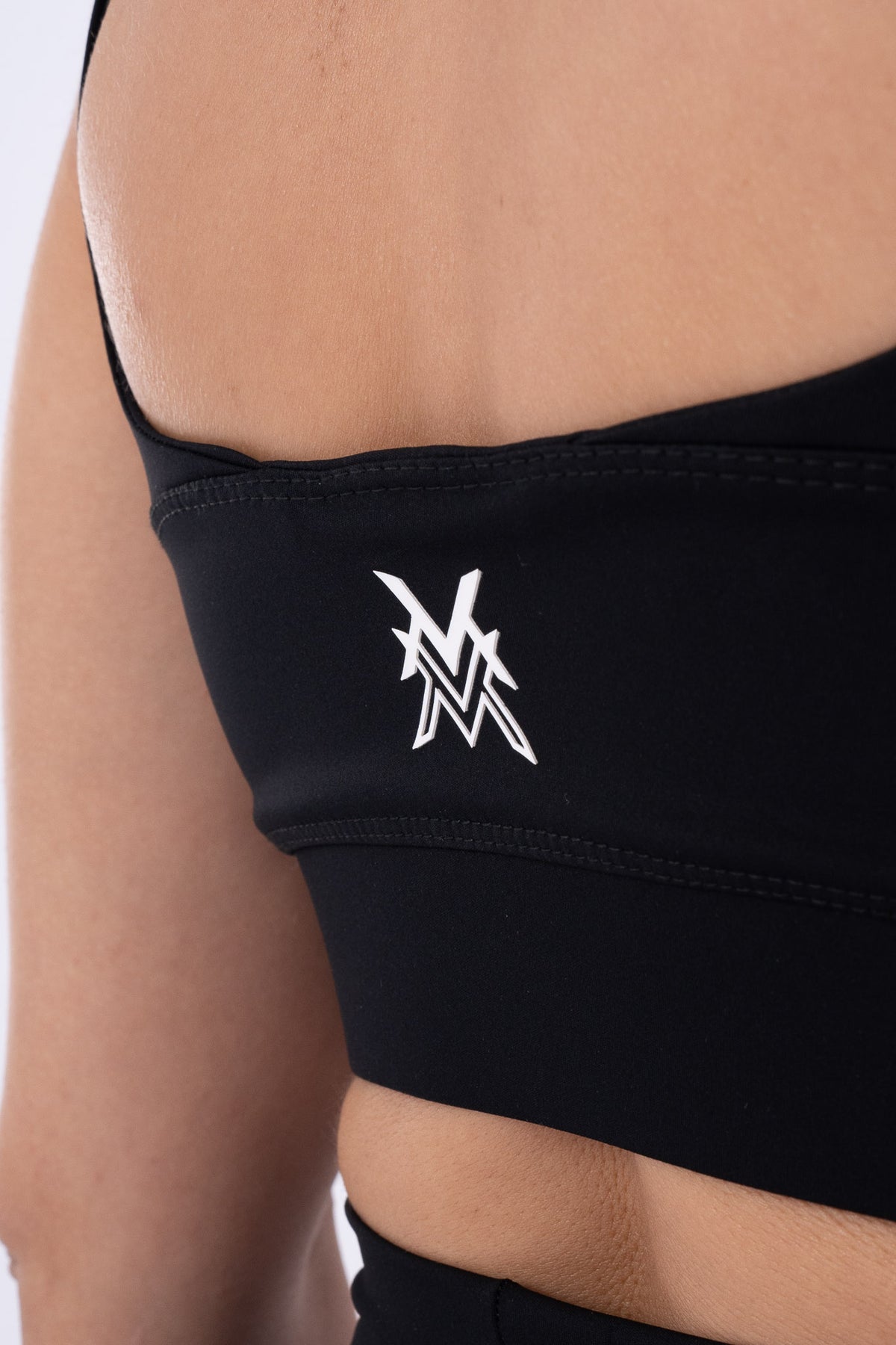 Women's VAN MILE Reborn Sports Bra in Black – back logo detail