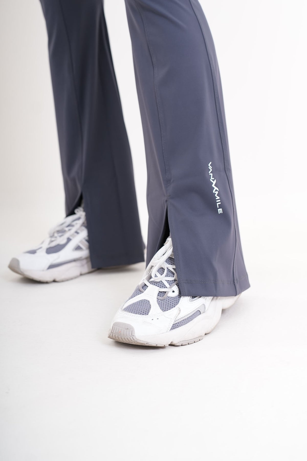 Women's VAN MILE AURORA Flared Leggings in Steel Blue – split hem and logo detail