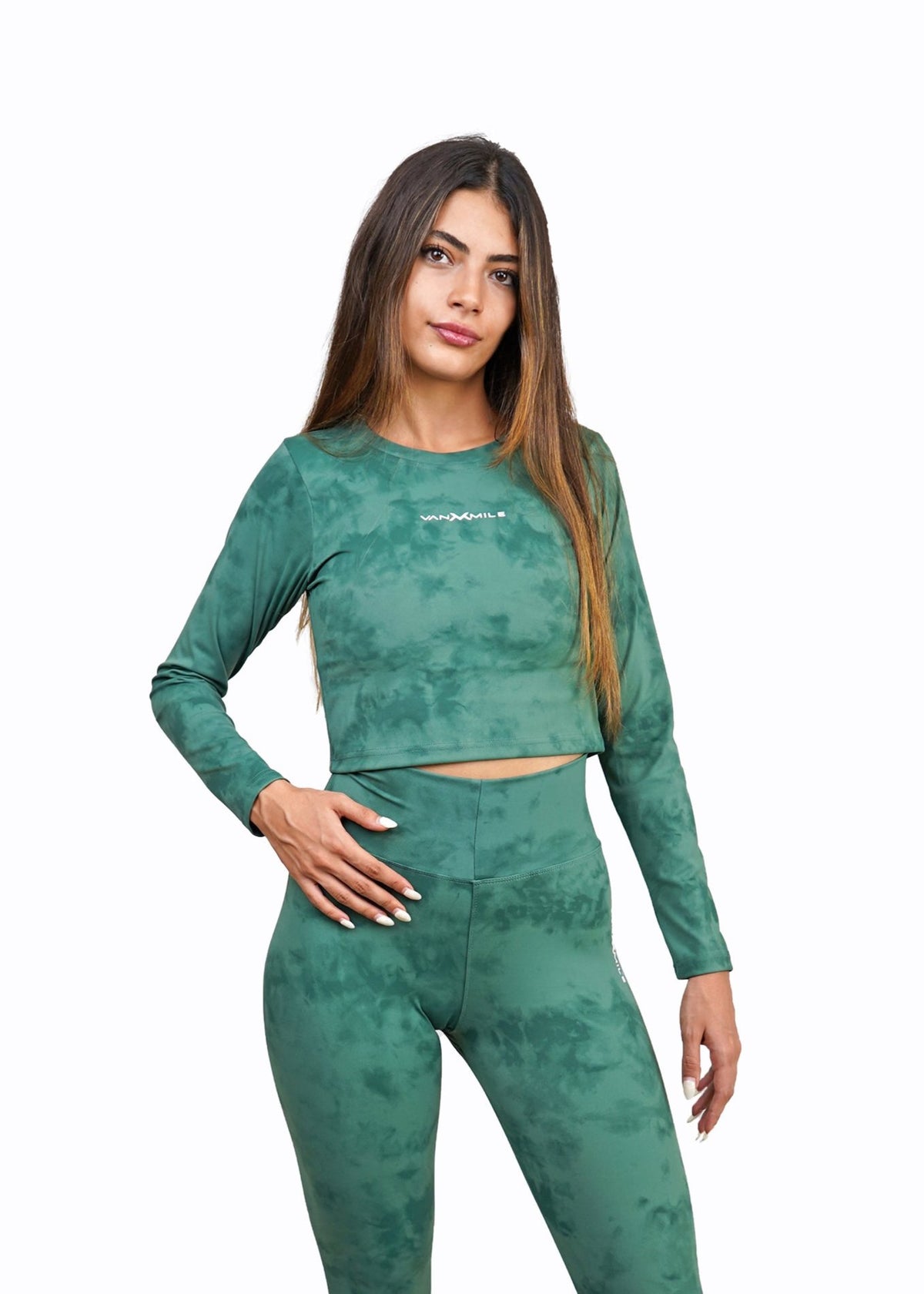 Women's VAN MILE Mist Crop Top Long Sleeve in Forest Green – front view, shown with matching leggings