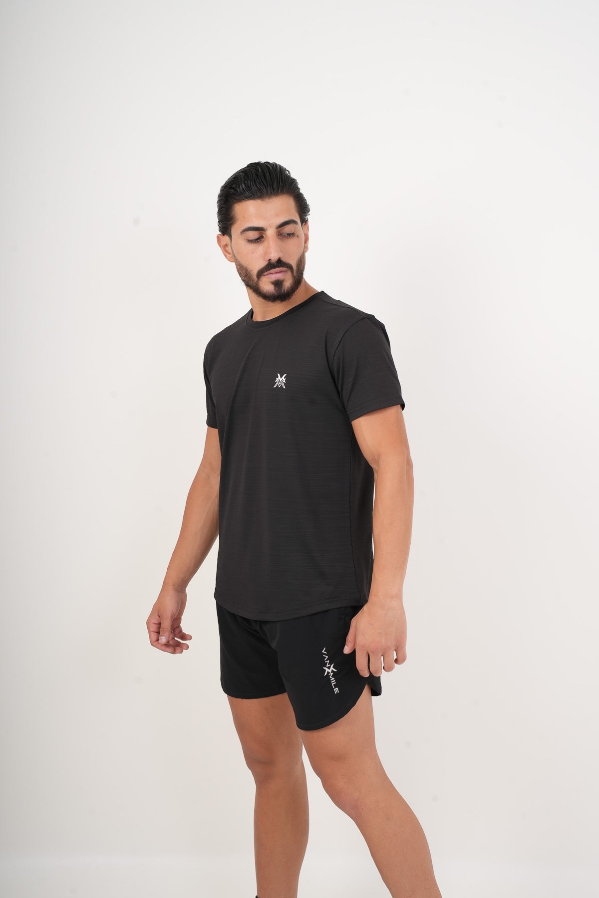 Men's VAN MILE MOTION Quick-Dry T-Shirt in Black – three-quarter front view