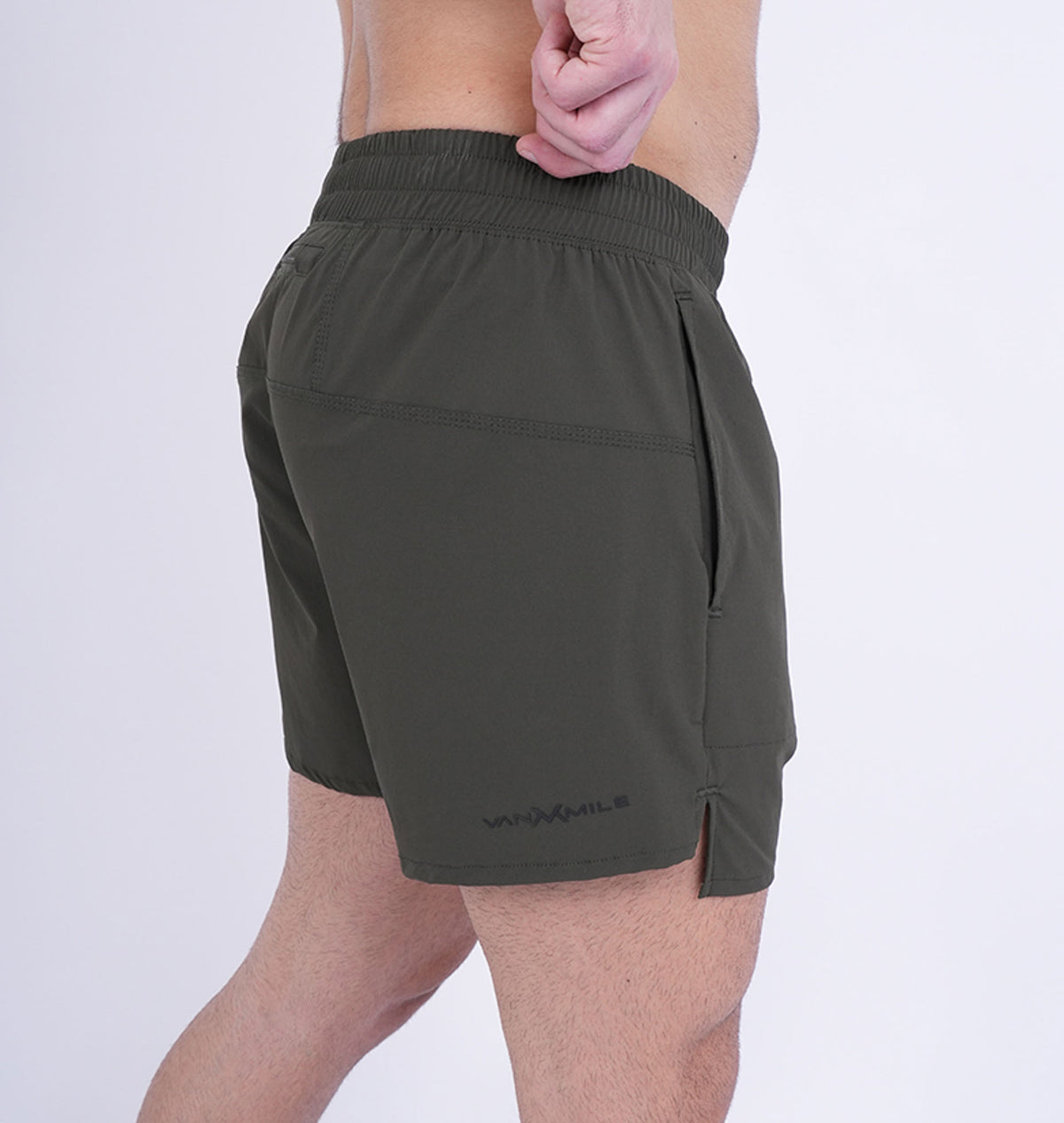 Men's VAN MILE Revive Shorts in Dark Green – side view from behind
