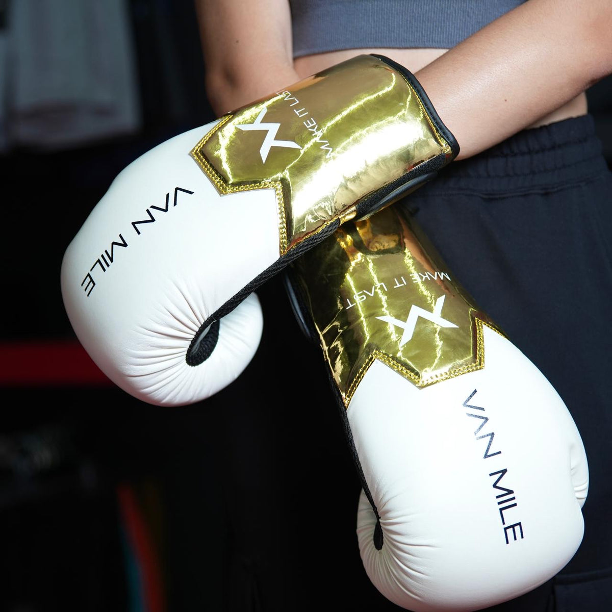 VAN MILE PU 3.0 Boxing Gloves in White & Gold – worn on model, front