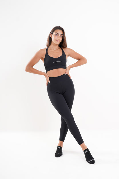 Women's VAN MILE AURORA Leggings in Black – front view, hands on hips