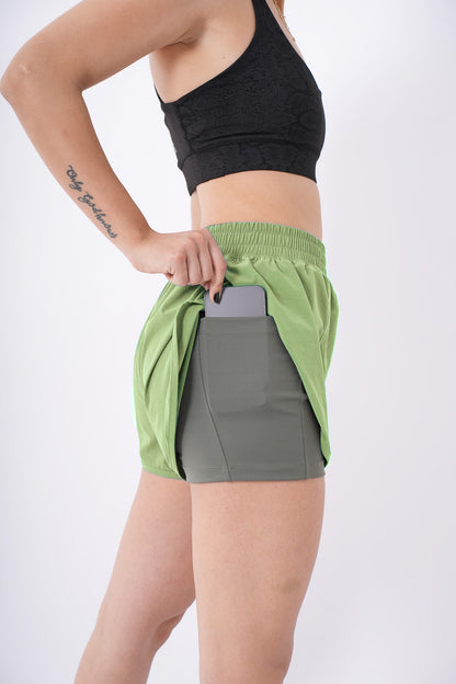 Women's VAN MILE Aurora Compression Shorts in Lime Green with Grey Liner – side view showing liner phone pocket
