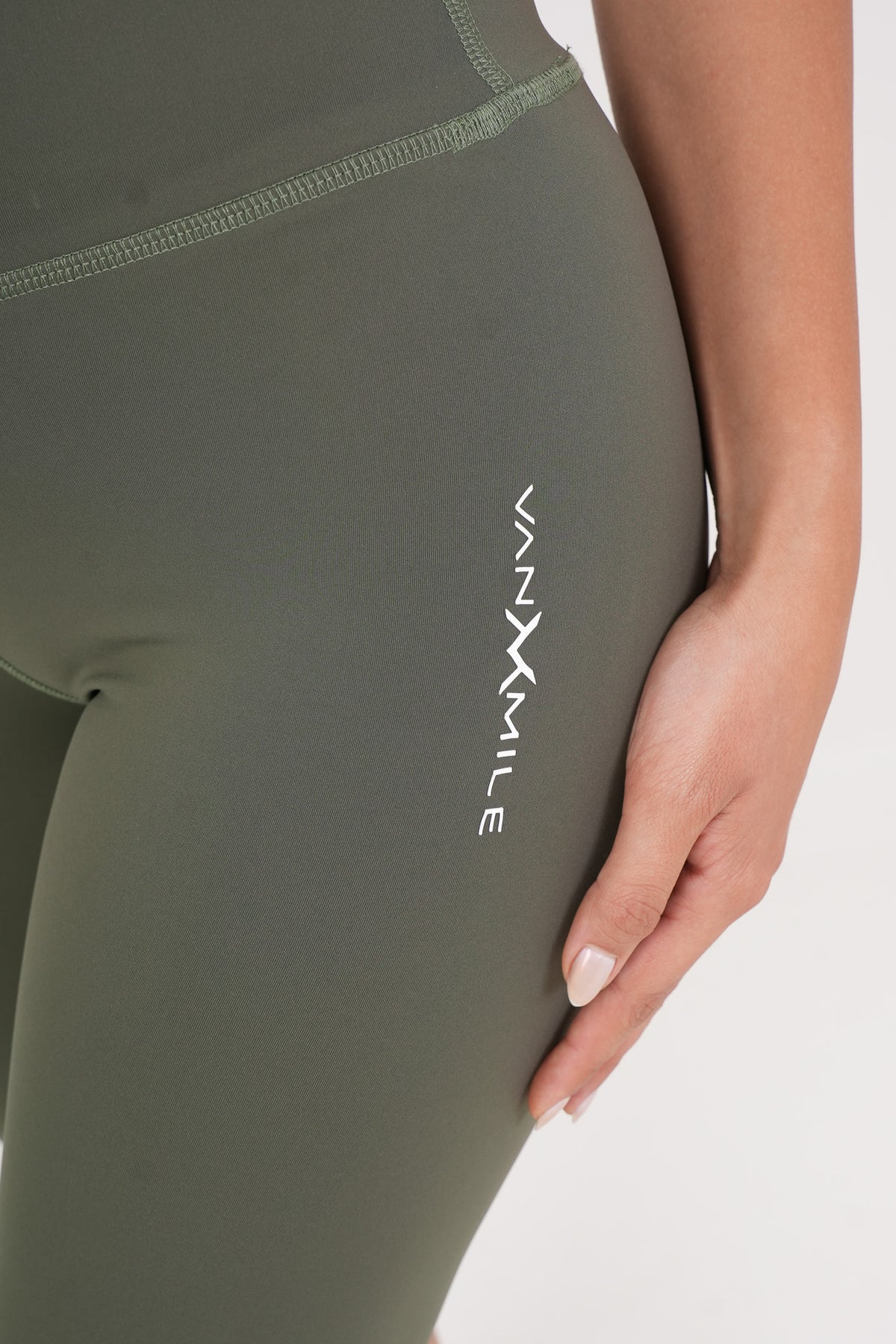 Women's VAN MILE AURORA Capri Leggings in Olive Green – logo detail