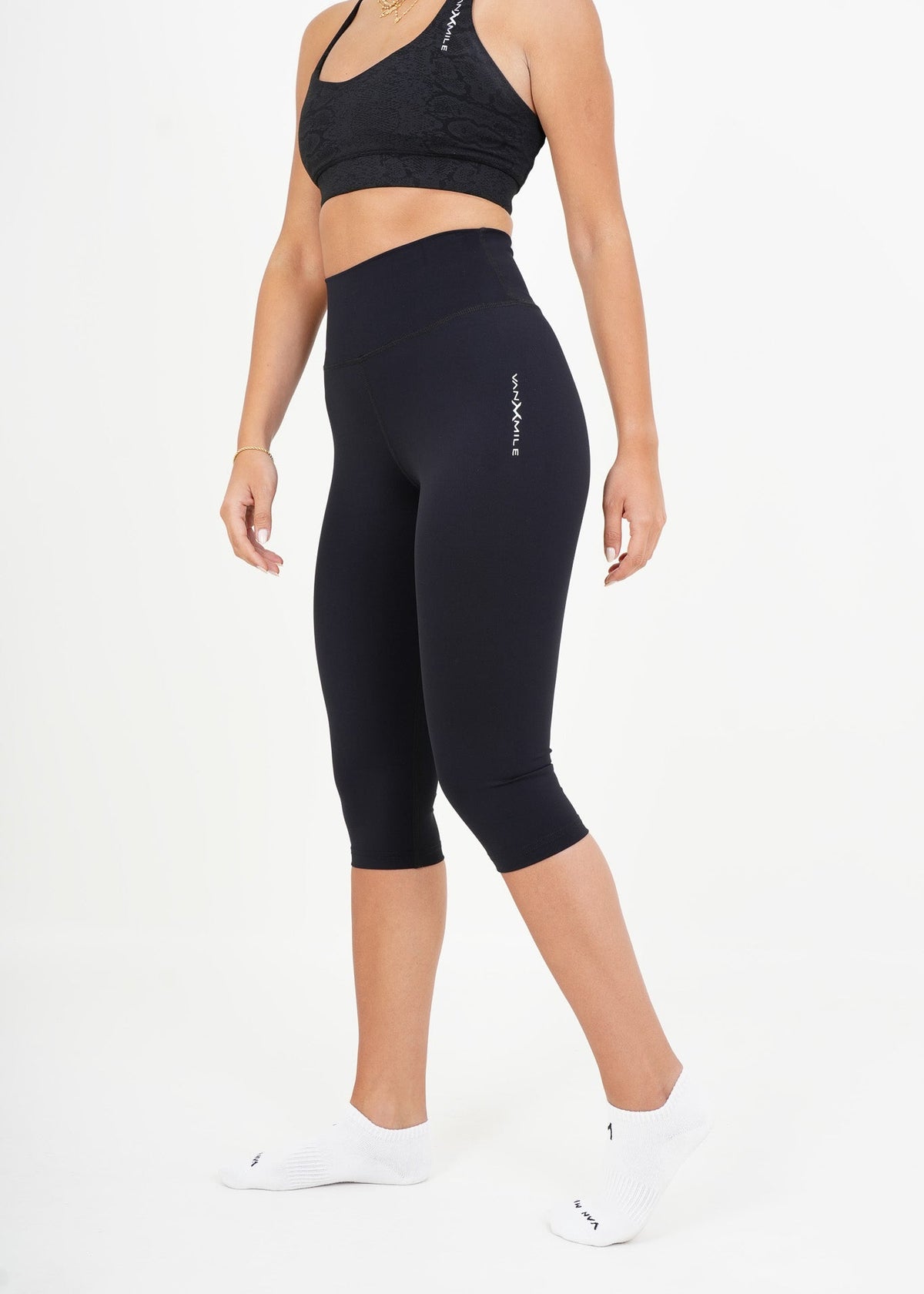 Women's VAN MILE AURORA Capri Leggings in Black – three-quarter front view