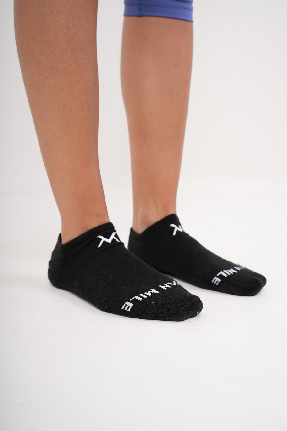 VAN MILE Origin No Show Socks in Black – pair shown, side view