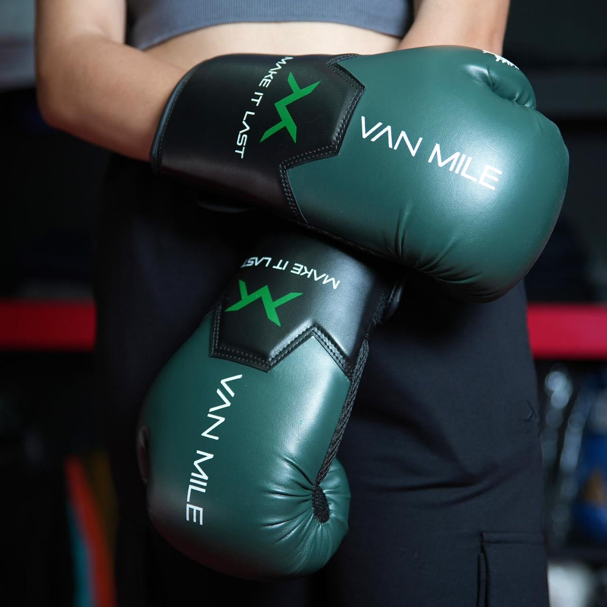VAN MILE PU 3.0 Boxing Gloves in Black & Green – worn on model, front