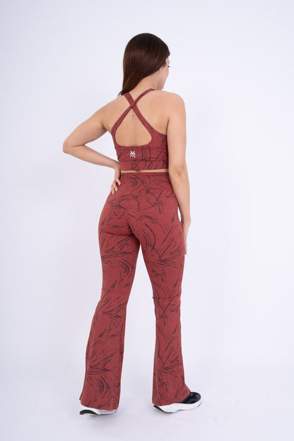 Women's VAN MILE Ignite Sports Bra in Red Printed – back view, shown with matching flared leggings