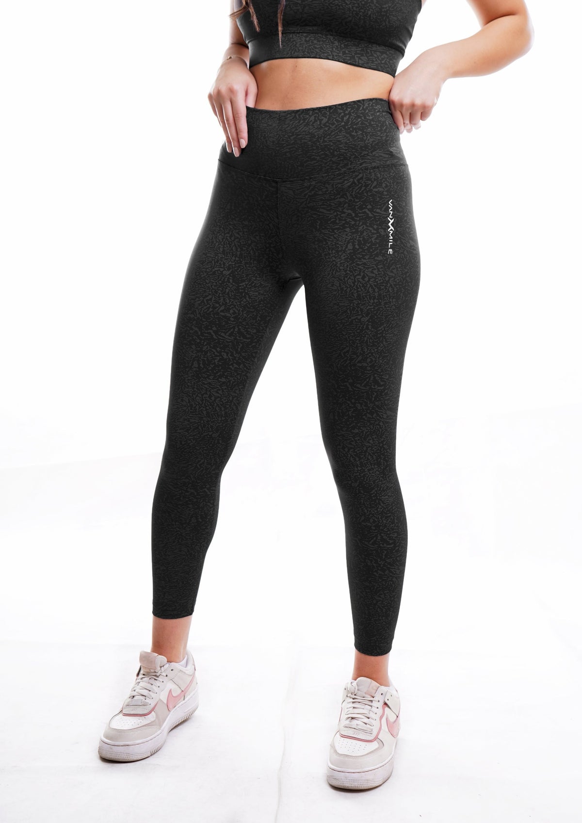 Women's VAN MILE Journey Leggings in Black – angled front view