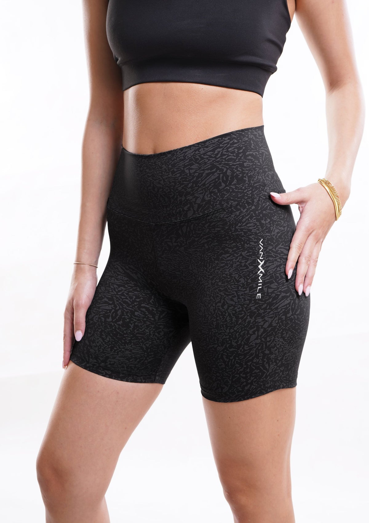 Women's VAN MILE Journey Biker Shorts in Black – angled front view