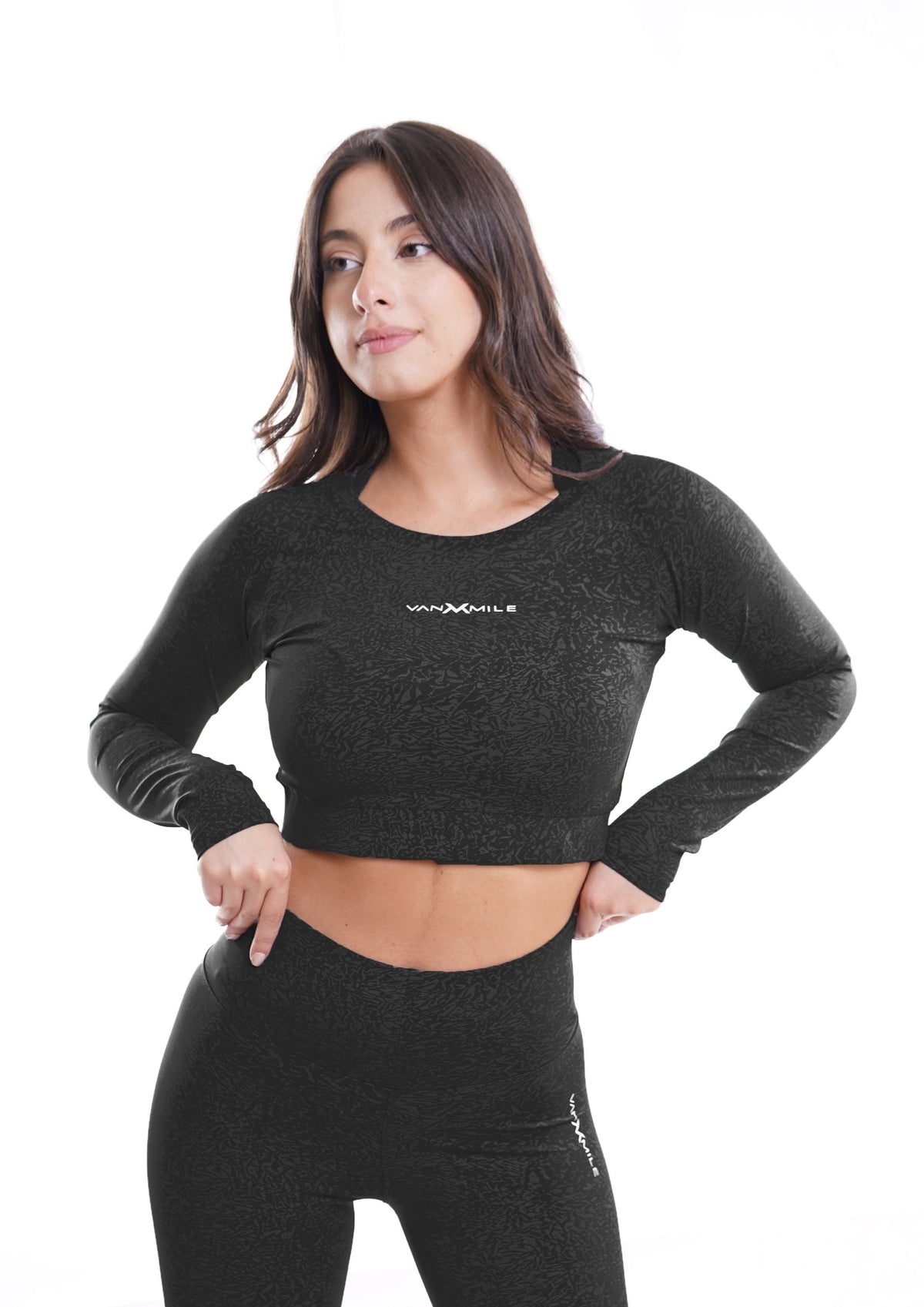 Women's VAN MILE Journey Cropped Long Sleeve Shirt in Black – front view, shown with matching leggings