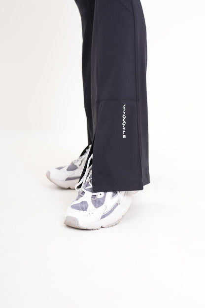 Women's VAN MILE AURORA Flared Leggings in Black – split hem and logo detail