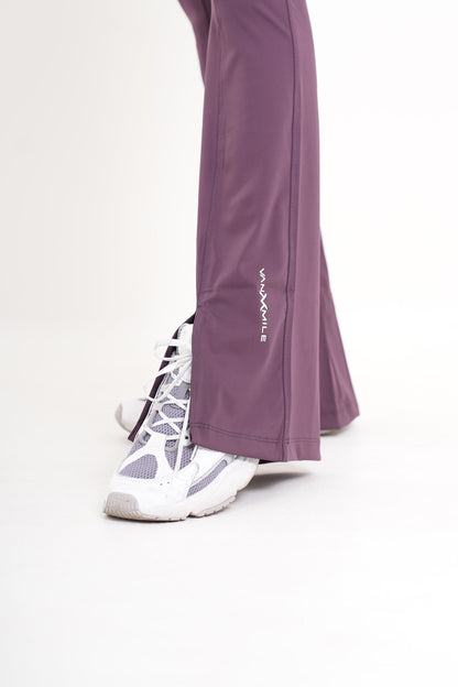 Women's VAN MILE AURORA Flared Leggings in Aubergine – split hem and logo detail