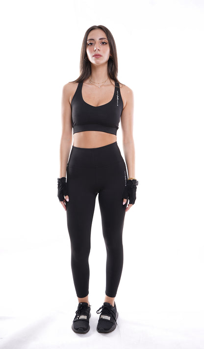 Women's VAN MILE Essential Leggings in Black – front view, shown with matching sports bra