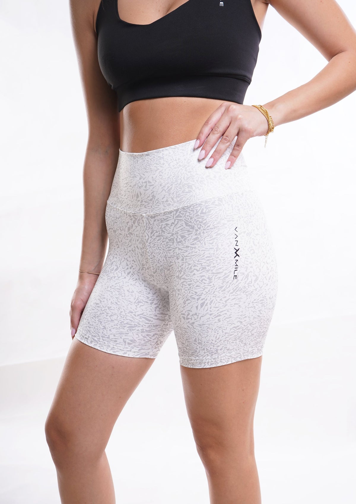 Women's VAN MILE Journey Biker Shorts in White – angled front view