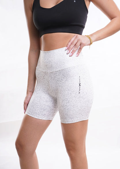 Women's VAN MILE Journey Biker Shorts in White – angled front view