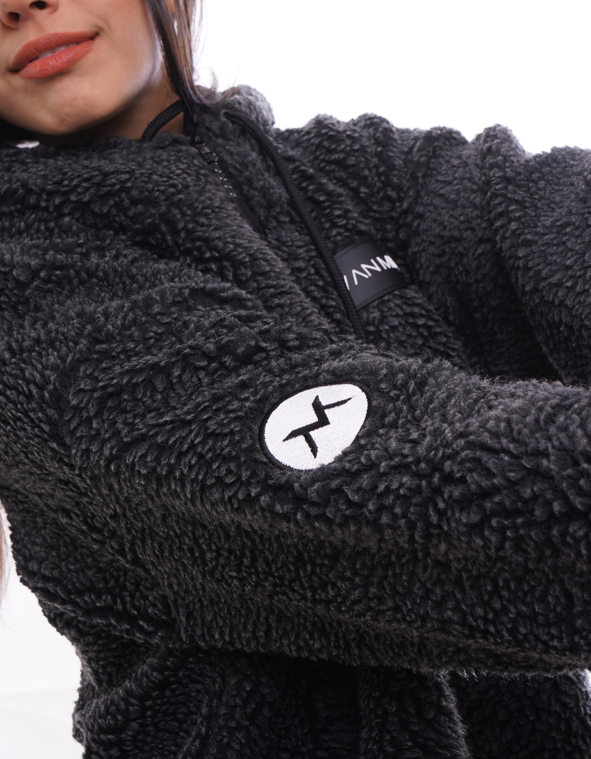 Women's VAN MILE LIMITED Edition Arctic Oversized Teddy Jacket in Black – sleeve logo patch detail