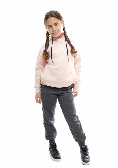 Kids' VAN MILE Everyday Kids Tracksuit in Pale Pink – front view, top worn with grey joggers