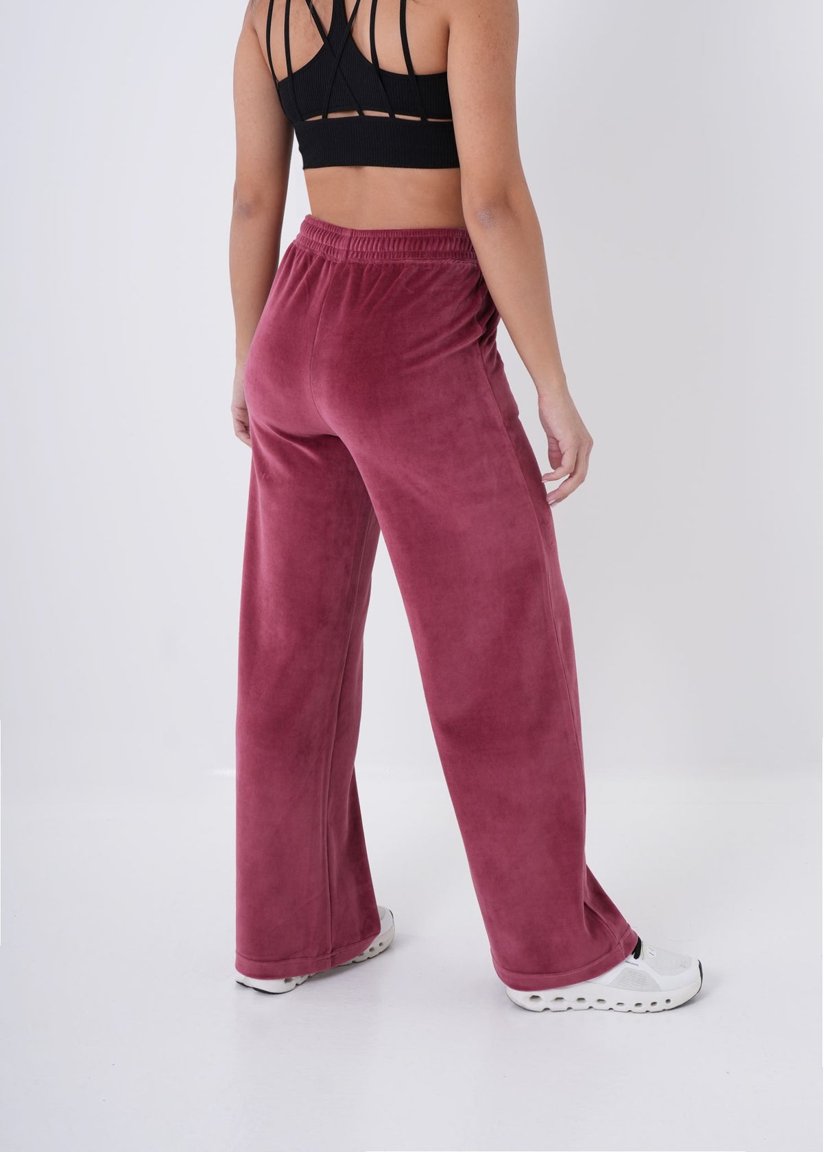 Women's VAN MILE Classic Velour Two-Piece Set in Ruby Red – back view of the wide-leg pants