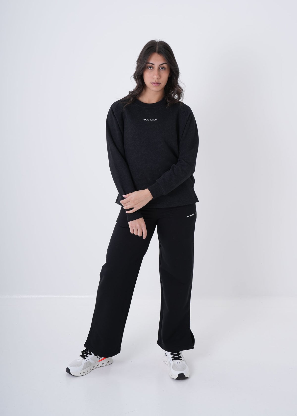 Women's VAN MILE VNML Printed Sweatshirt in Black – front view, shown with matching flared pants