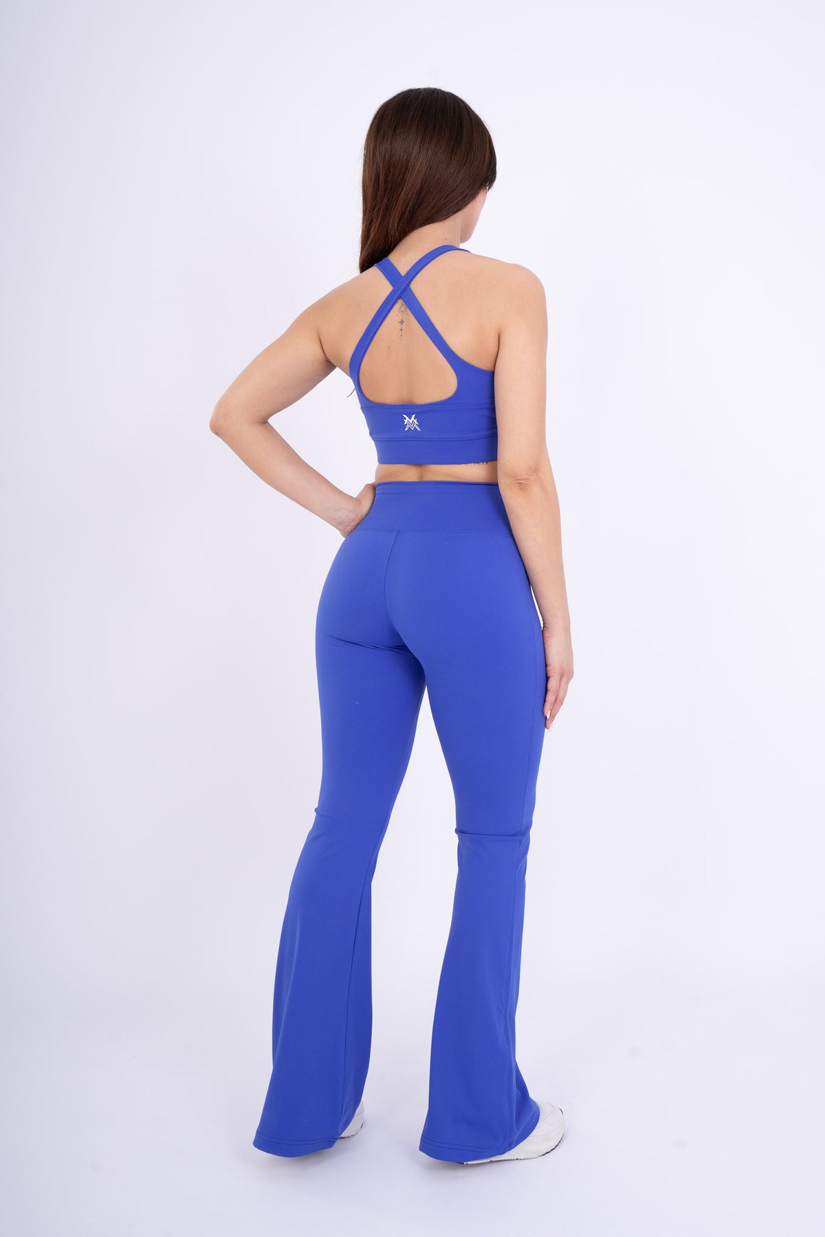 Women's VAN MILE Reborn Sports Bra in Blue – back view, shown with matching flared leggings