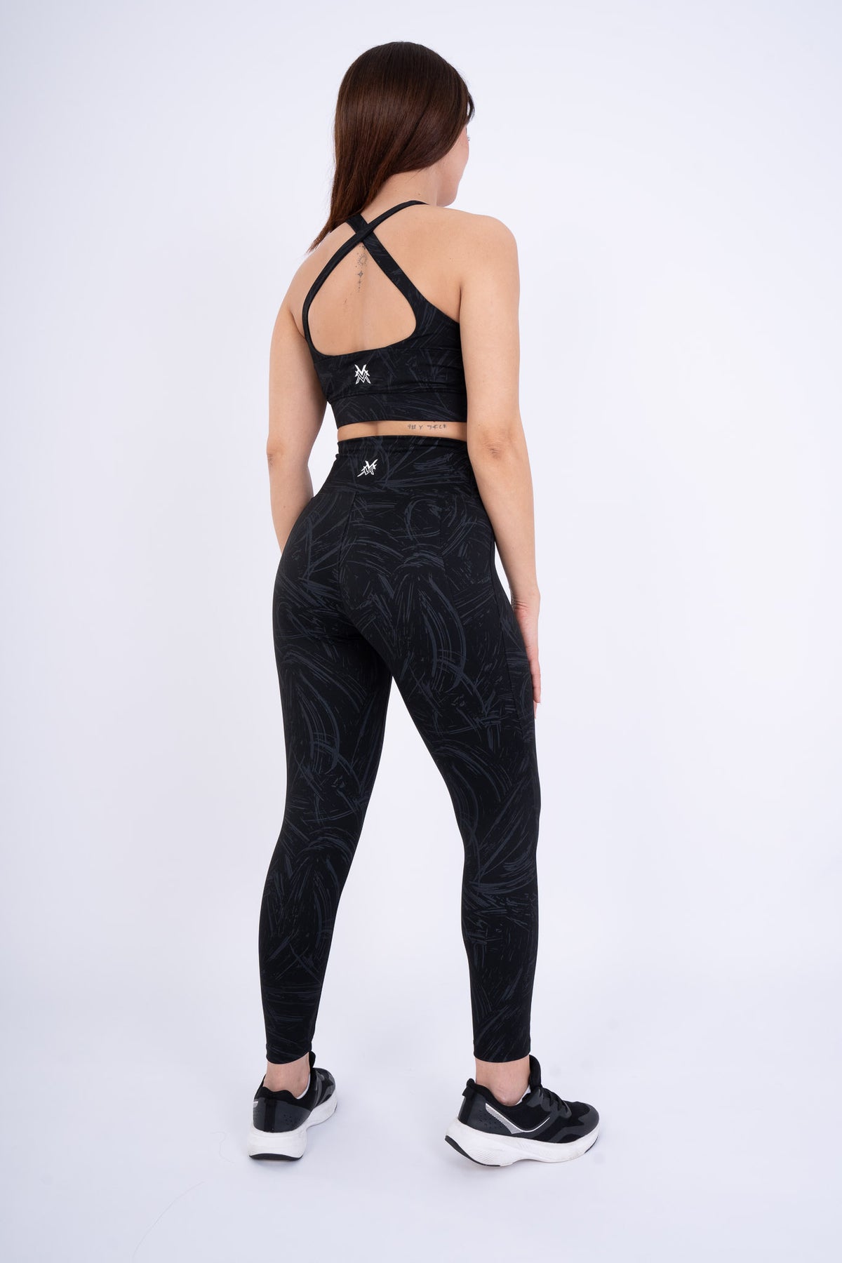 Women's VAN MILE Ignite Sports Bra in Black Printed – back view, shown with matching leggings