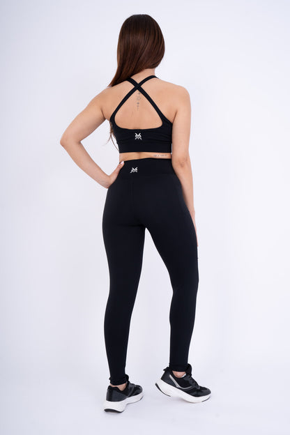 Women's VAN MILE Reborn Leggings in Black – back view, shown with matching sports bra
