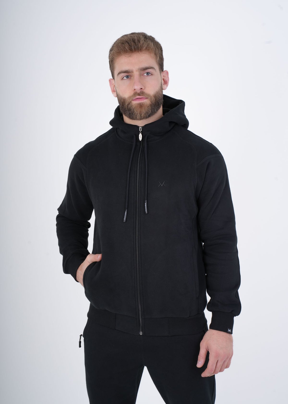 Men's VAN MILE VNML Full Zip Hoodie in Black – front view, hand in pocket