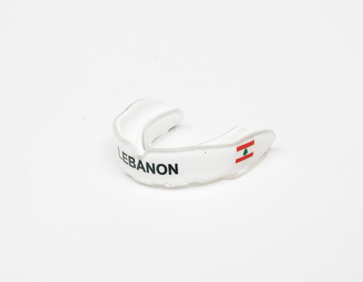 VAN MILE LIMITED Edition Lebanon Mouth Guard Double Layer in White – angled view with Lebanese flag