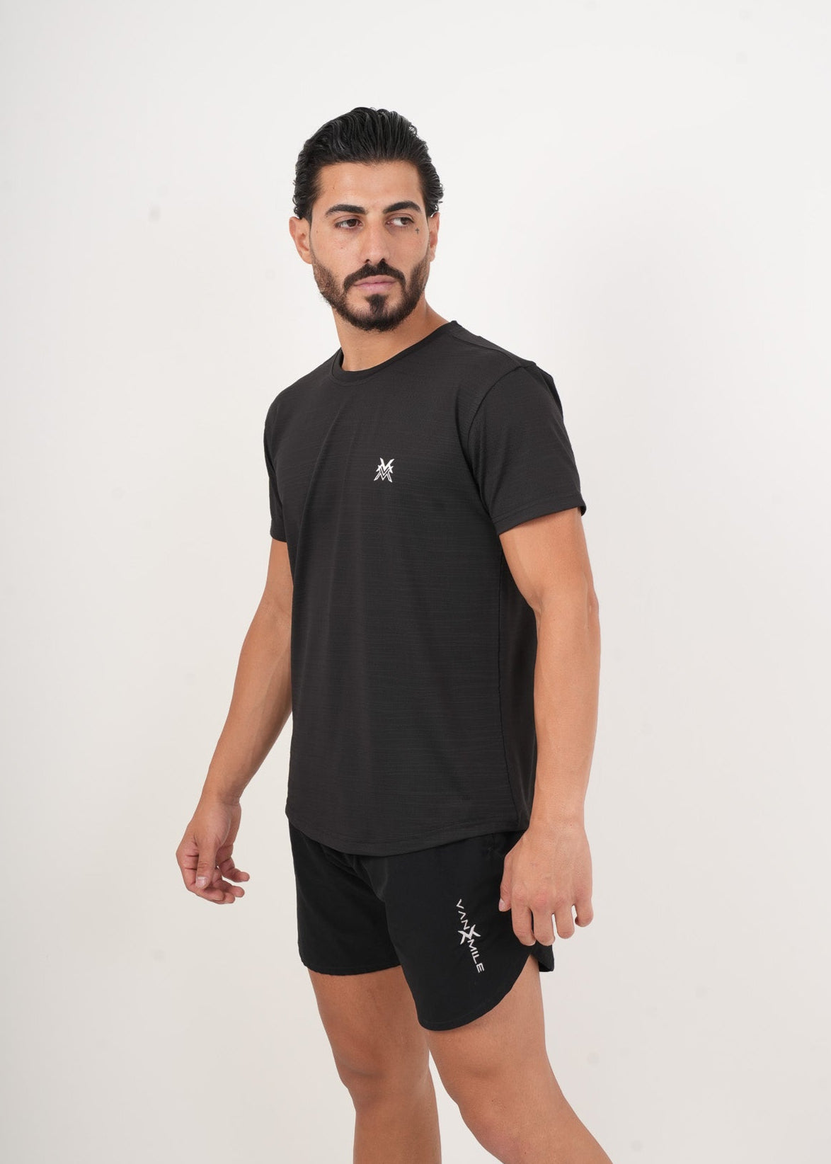 Men's VAN MILE MOTION Quick-Dry T-Shirt in Black – angled front view