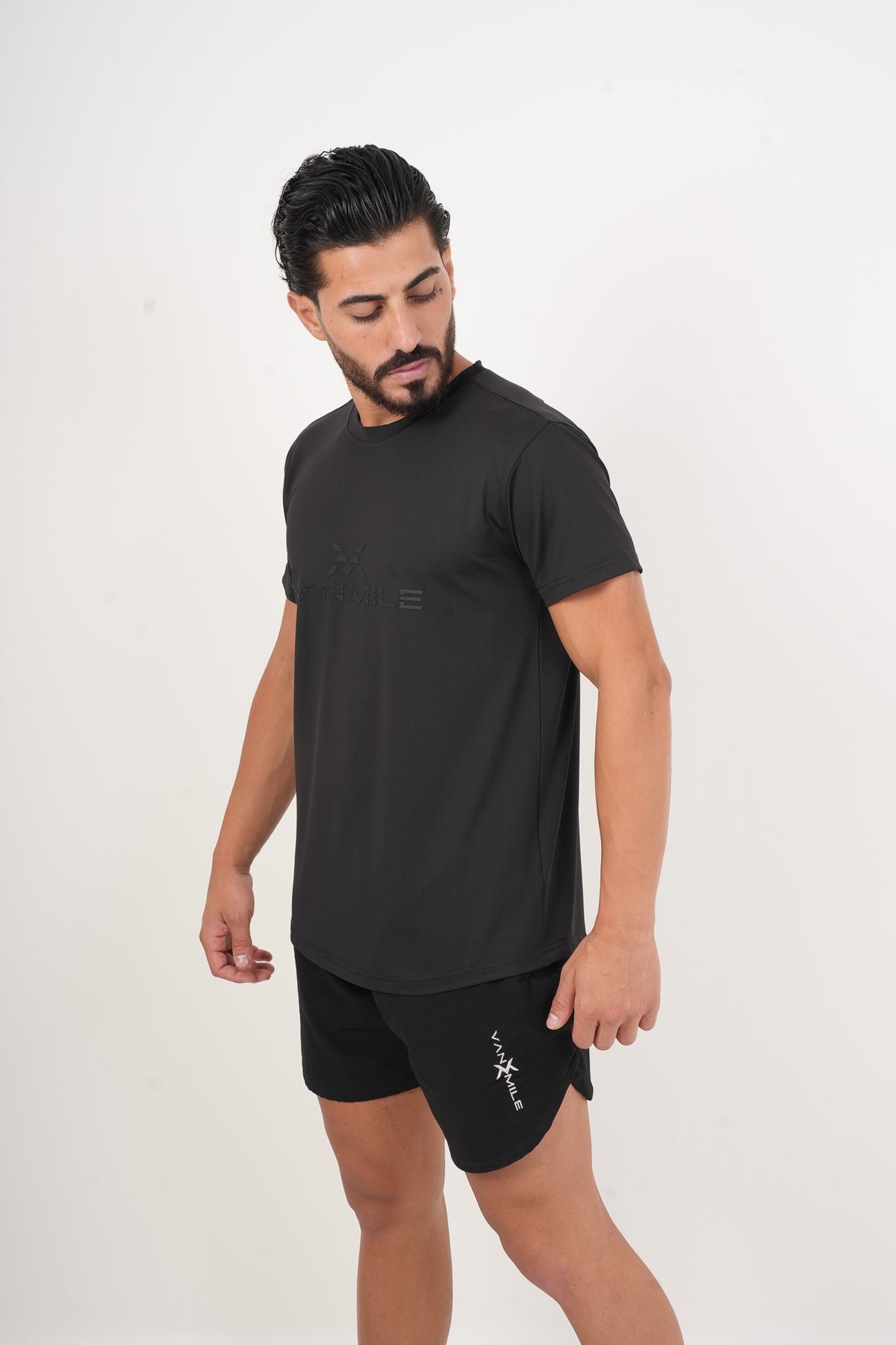 Men's VAN MILE ORIGIN Quick-Dry T-Shirt in Black On Black – angled front view