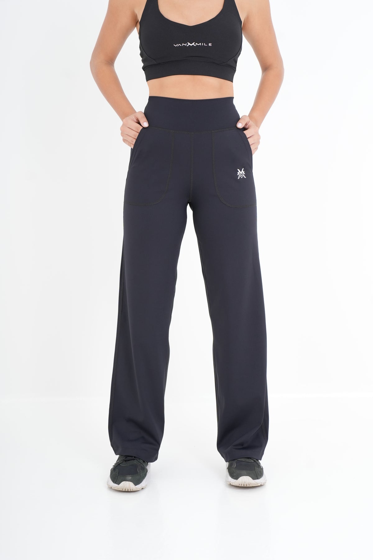 Women's VAN MILE PULSE Flared Leggings in Black – front view