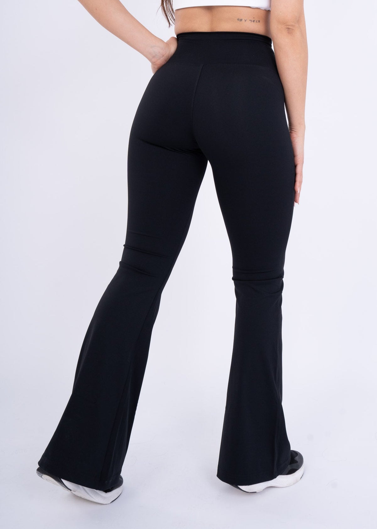 Women's VAN MILE Reborn Flared Leggings in Black – back view