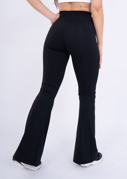 Women's VAN MILE Reborn Flared Leggings in Black – back view