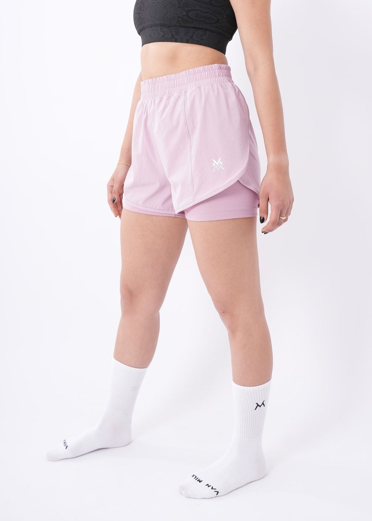 Women's VAN MILE Aurora Compression Shorts in Pink – angled front view, full length