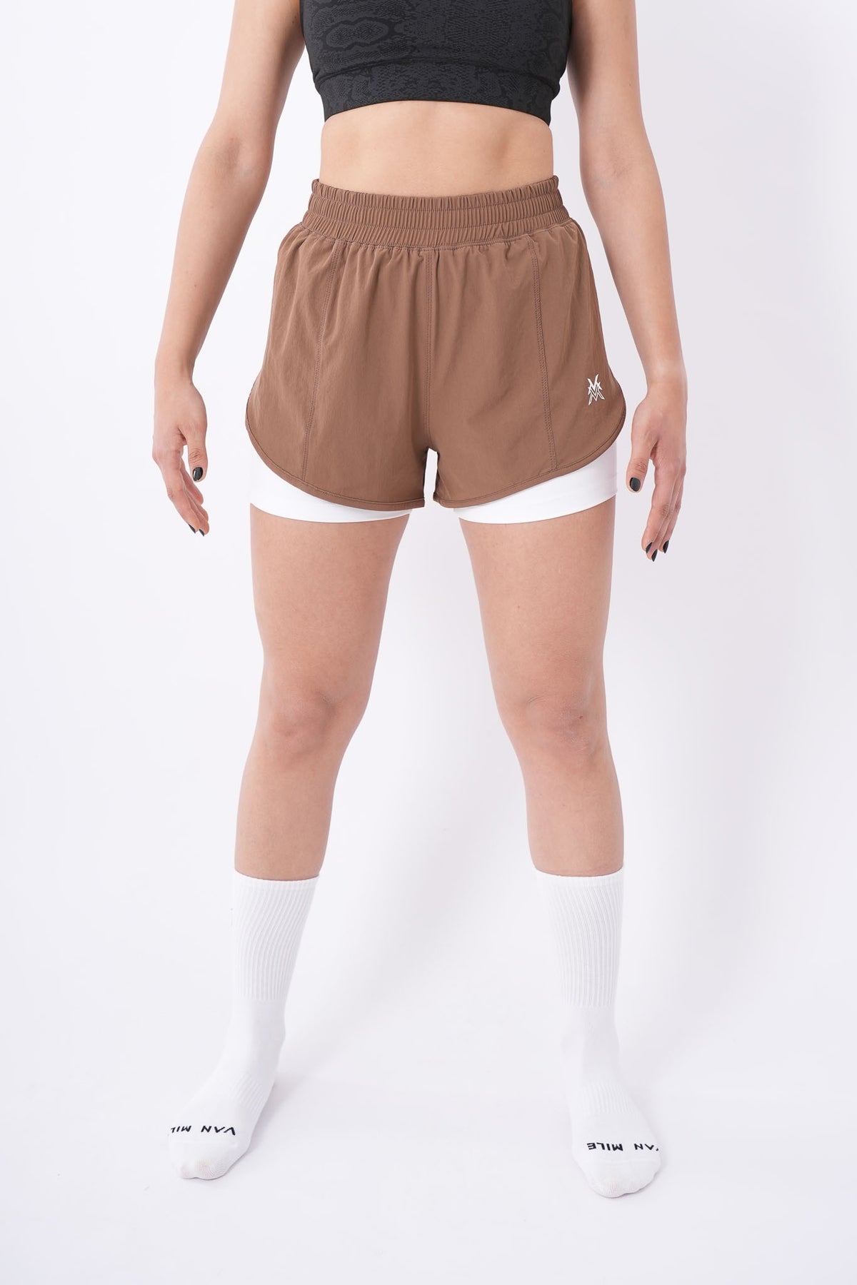 Women's VAN MILE Aurora Compression Shorts in Brown – front view, full length