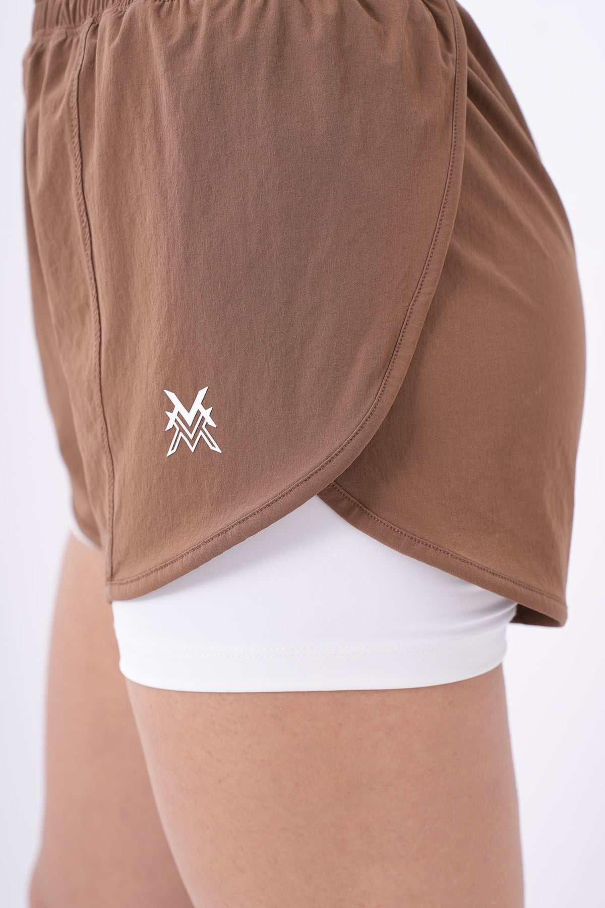 Women's VAN MILE Aurora Compression Shorts in Brown – logo detail
