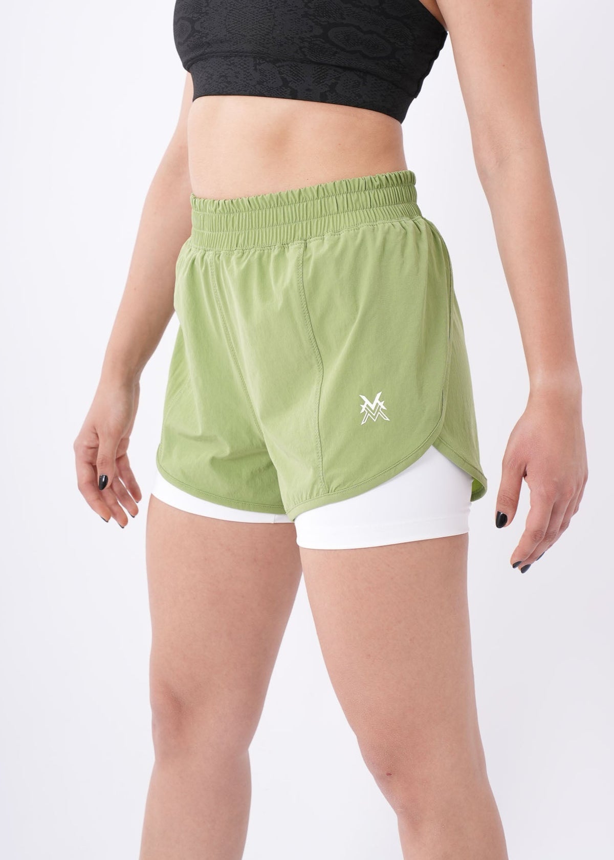 Women's VAN MILE Aurora Compression Shorts in Lime Green with White Liner – angled front view
