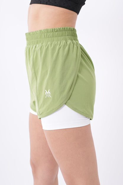 Women's VAN MILE Aurora Compression Shorts in Lime Green with White Liner – side view