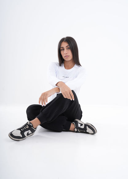 Women's VAN MILE VNML Long Sleeve Quick-Dry T-Shirt in White – seated full-length view