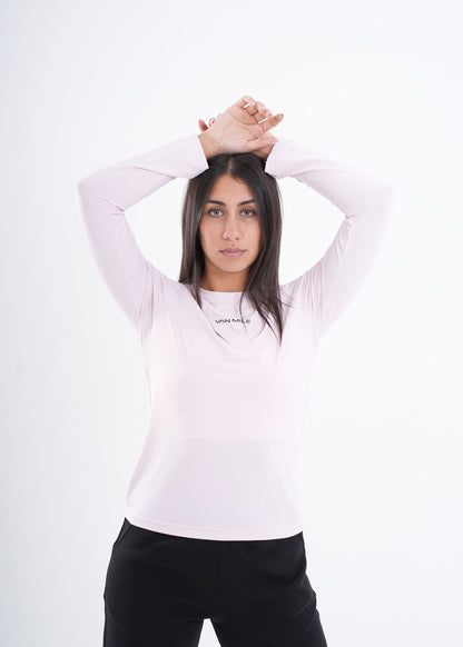 Women's VAN MILE VNML Long Sleeve Quick-Dry T-Shirt in Light Pink – front view, arms raised