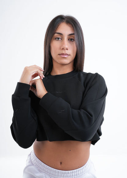 Women's VAN MILE VNML Two-Piece Crop Set in Black – cropped sweatshirt, worn with light grey joggers