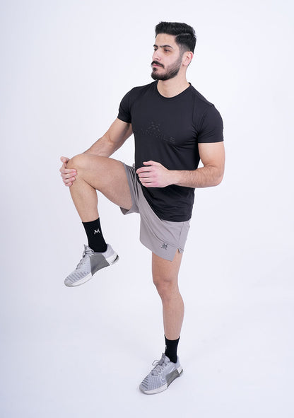 Men's VAN MILE Revive Shorts in Grey – lifestyle shot, worn with black T-shirt