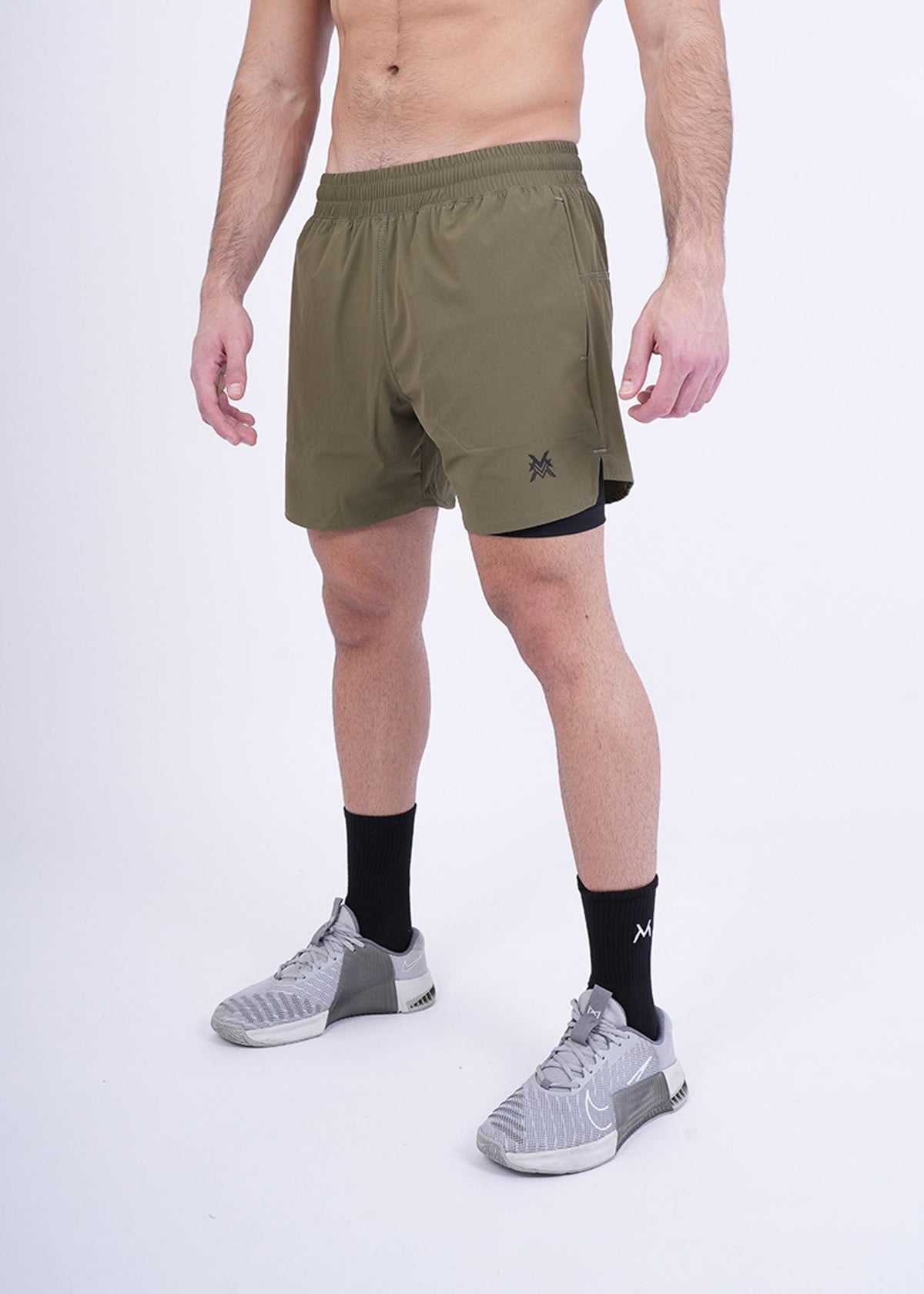 Men's VAN MILE Revive Compression Shorts in Army Green – front view
