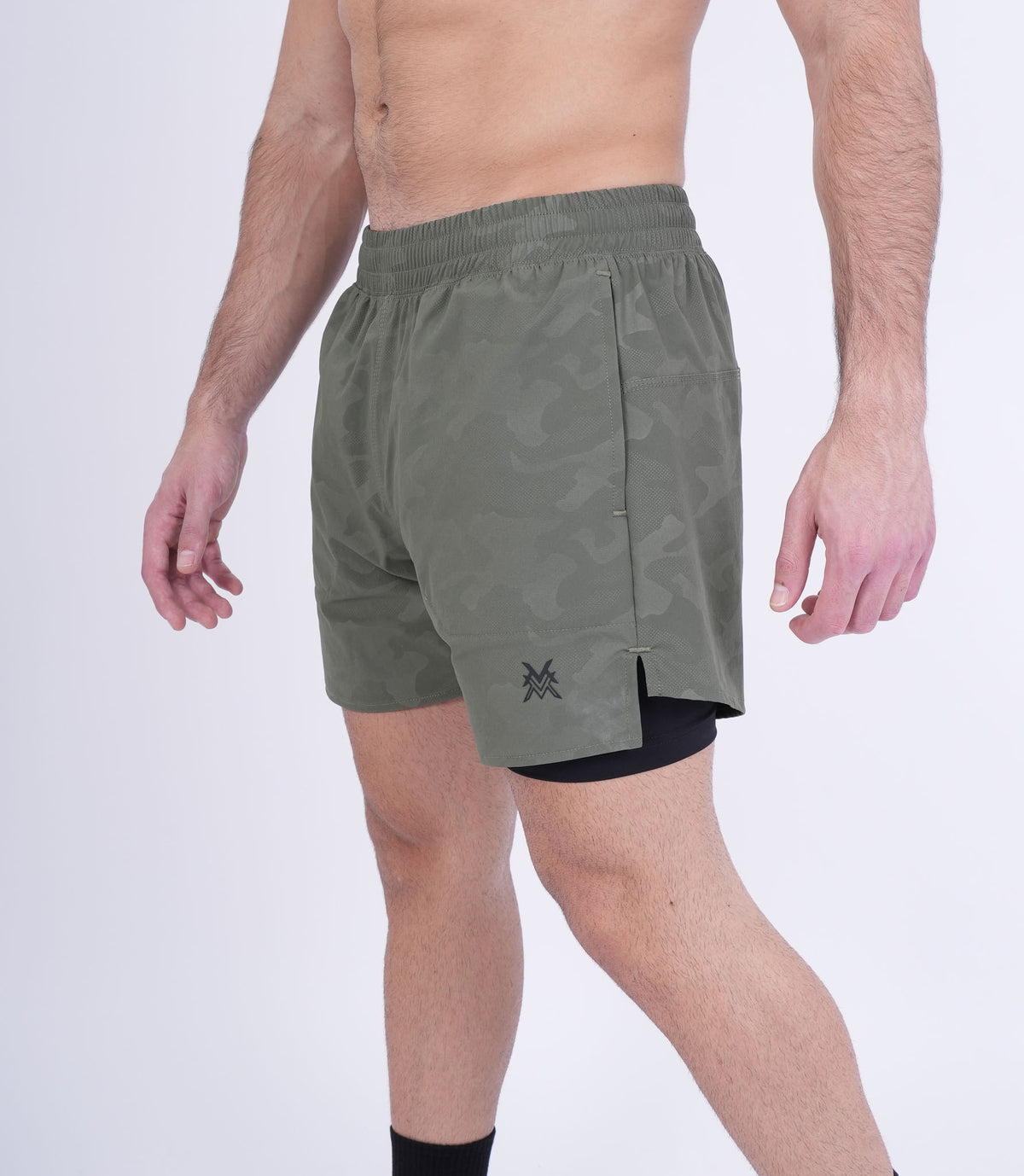 Men's VAN MILE Revive Compression Shorts in Camo Olive Green – three-quarter front view