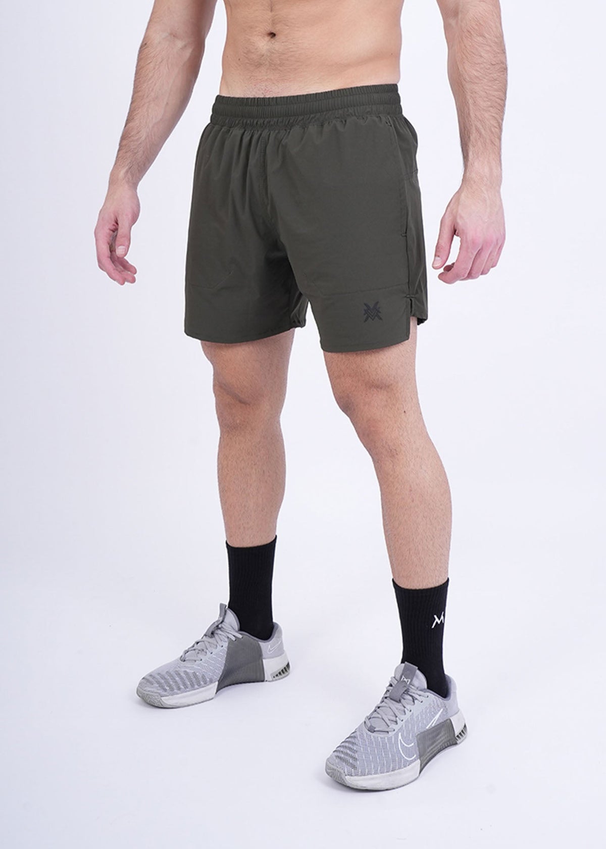 Men's VAN MILE Revive Shorts in Dark Green – front view