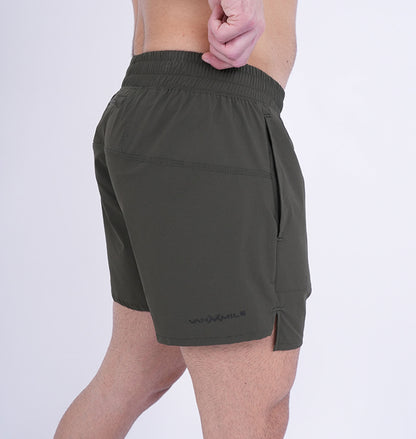 Men's VAN MILE Revive Shorts in Dark Green – side view from behind