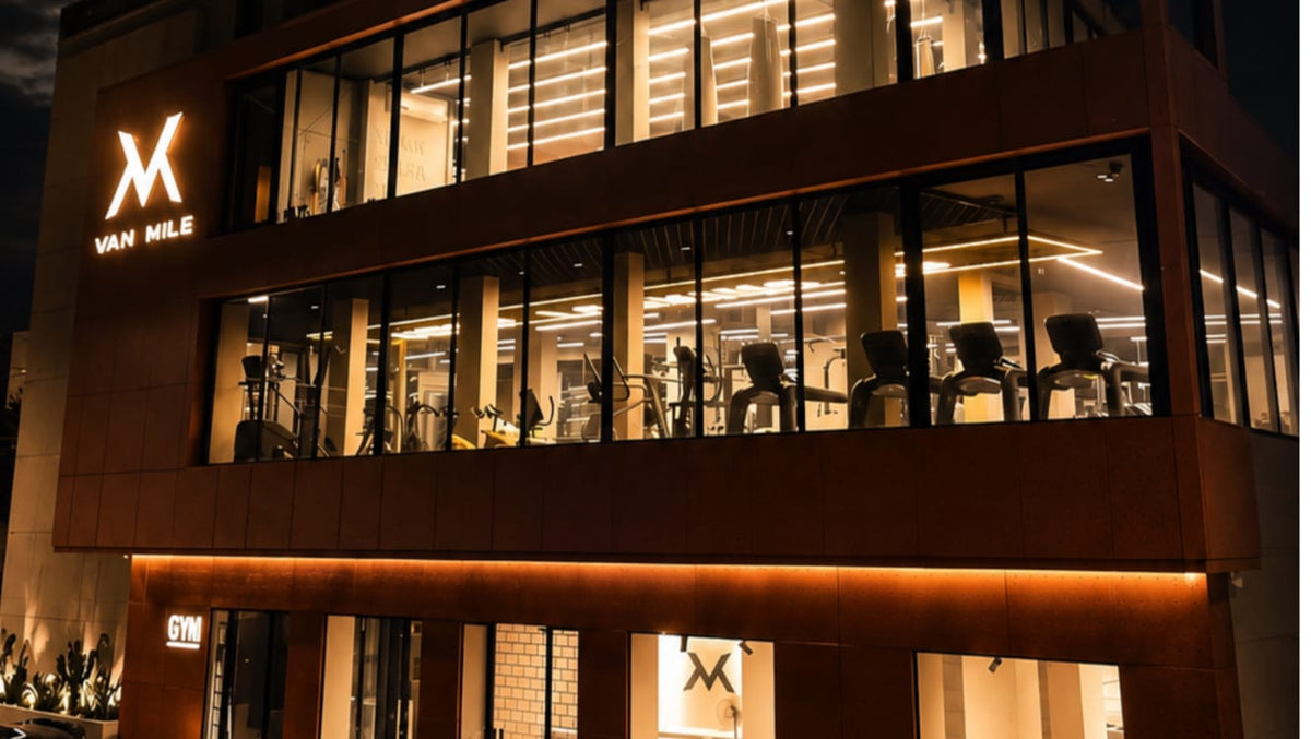 The VAN MILE Gym and showroom building in Mtayleb at night